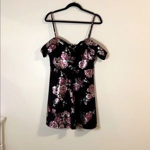 A line off the shoulder black floral dress